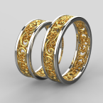 Zlaté snubní prstýnky s romantickými křivkami